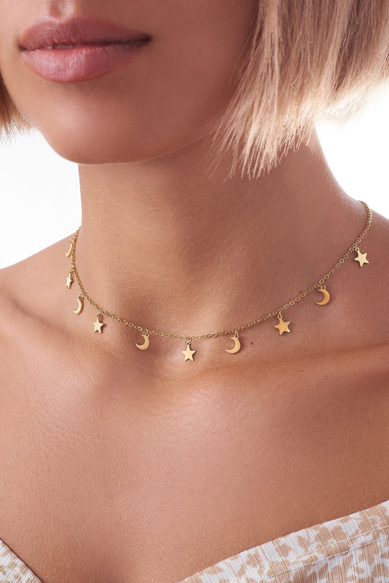 Necklace with moons and stars