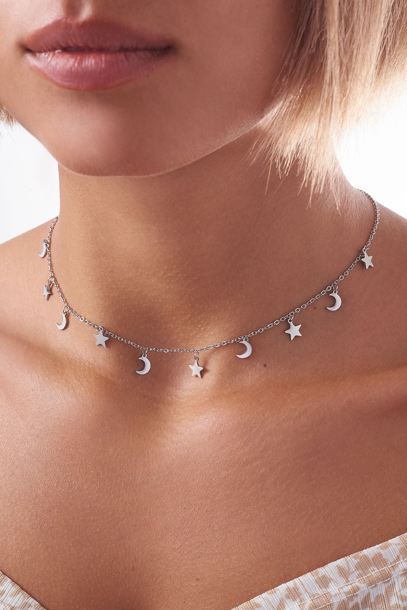 Necklace with moons and stars