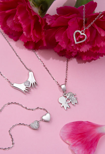 Silver necklace hands with heart