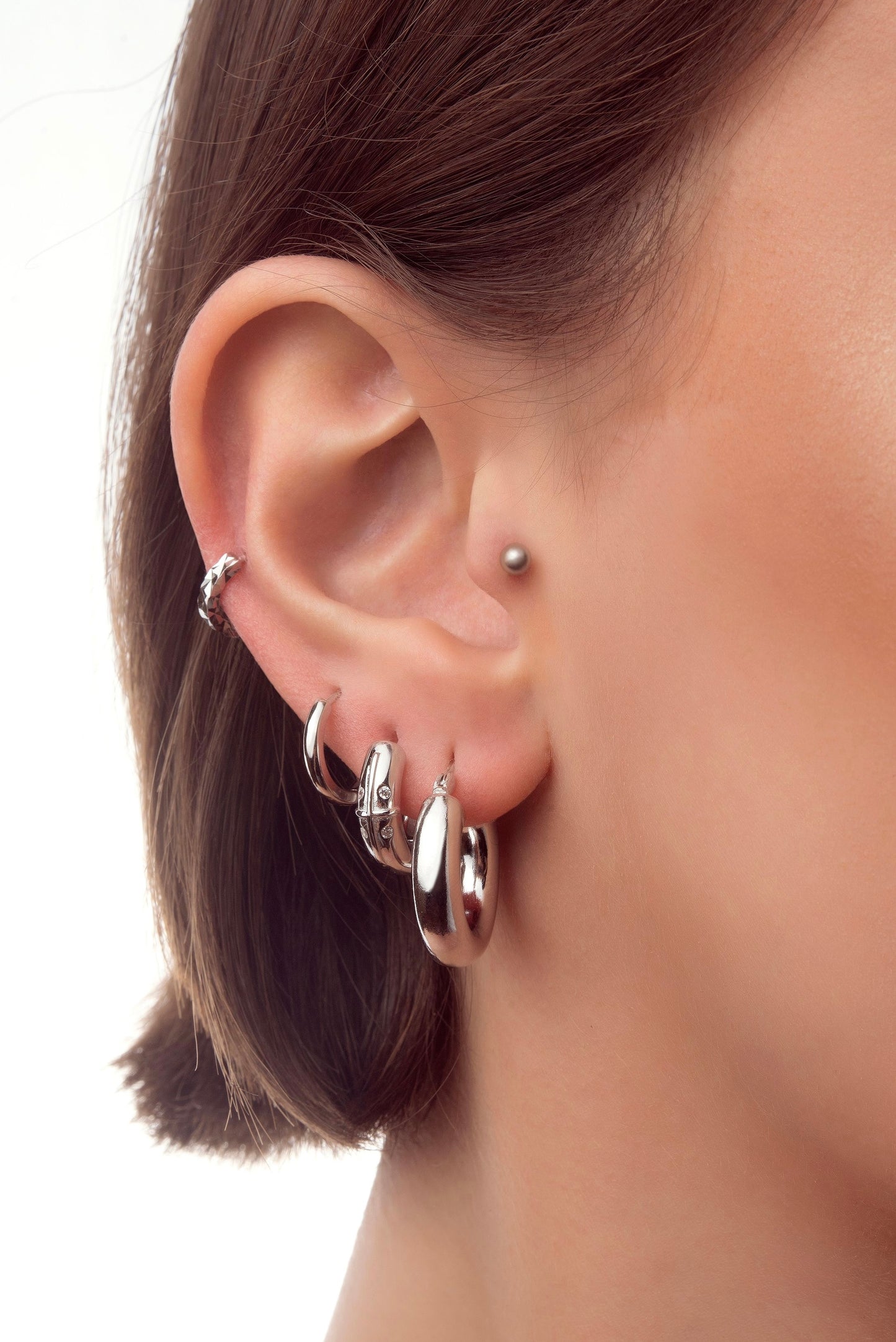 Silver earring piercing