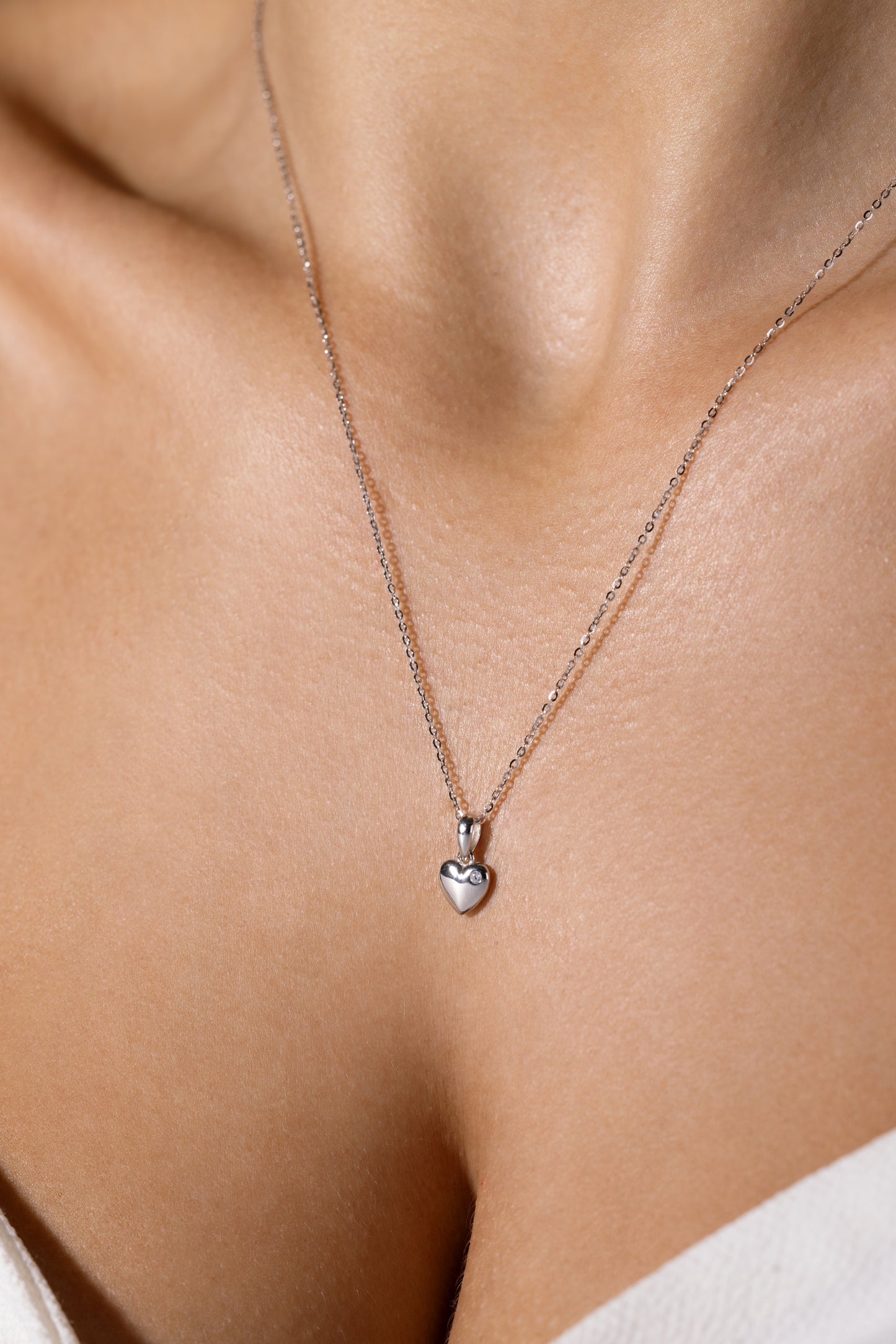 Silver necklace heart with zircon