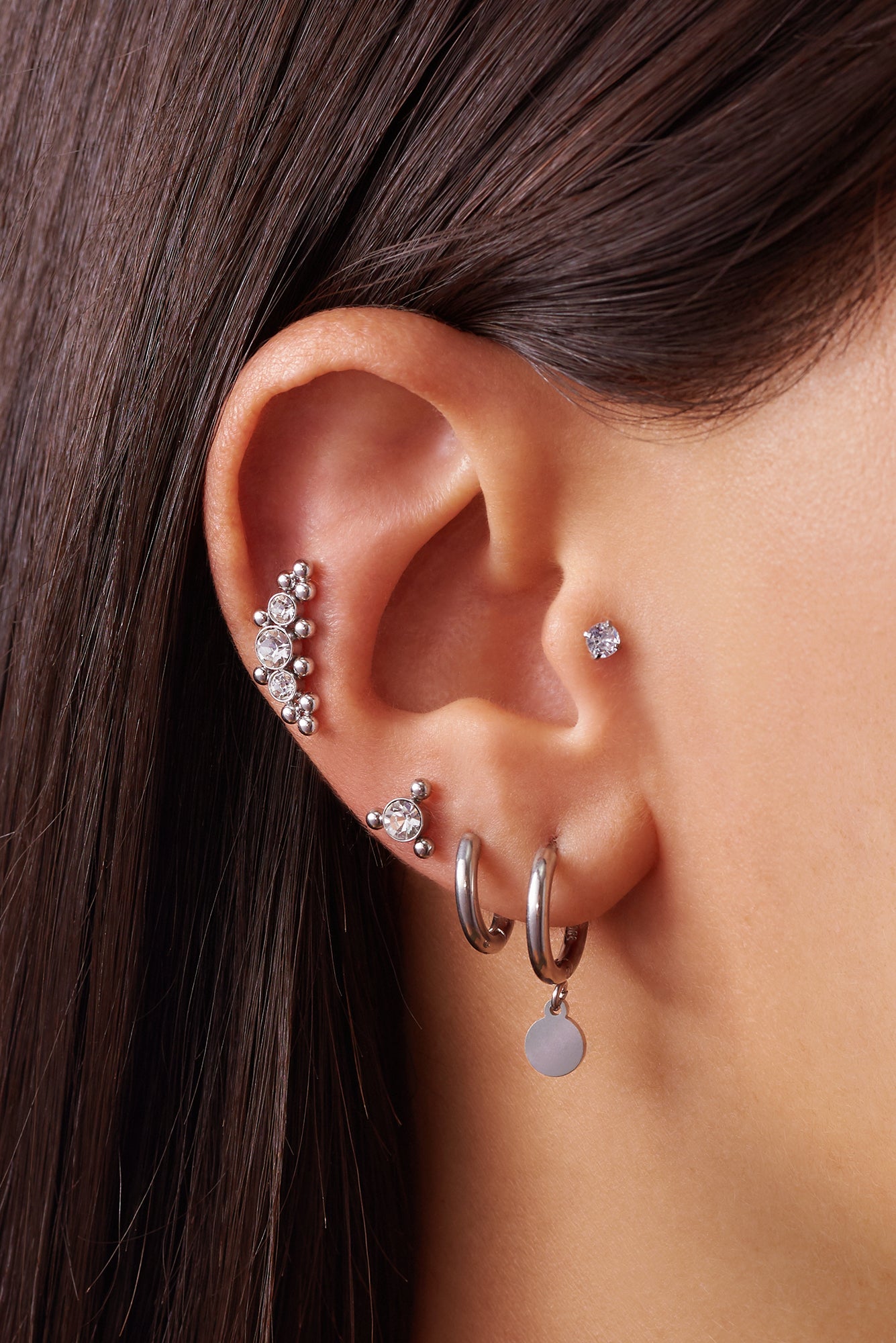 Silver earring piercing