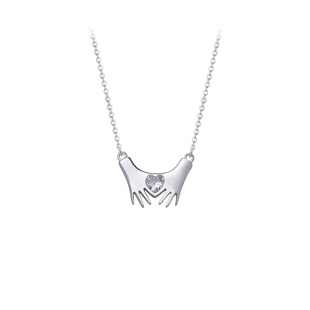 Silver necklace hands with heart