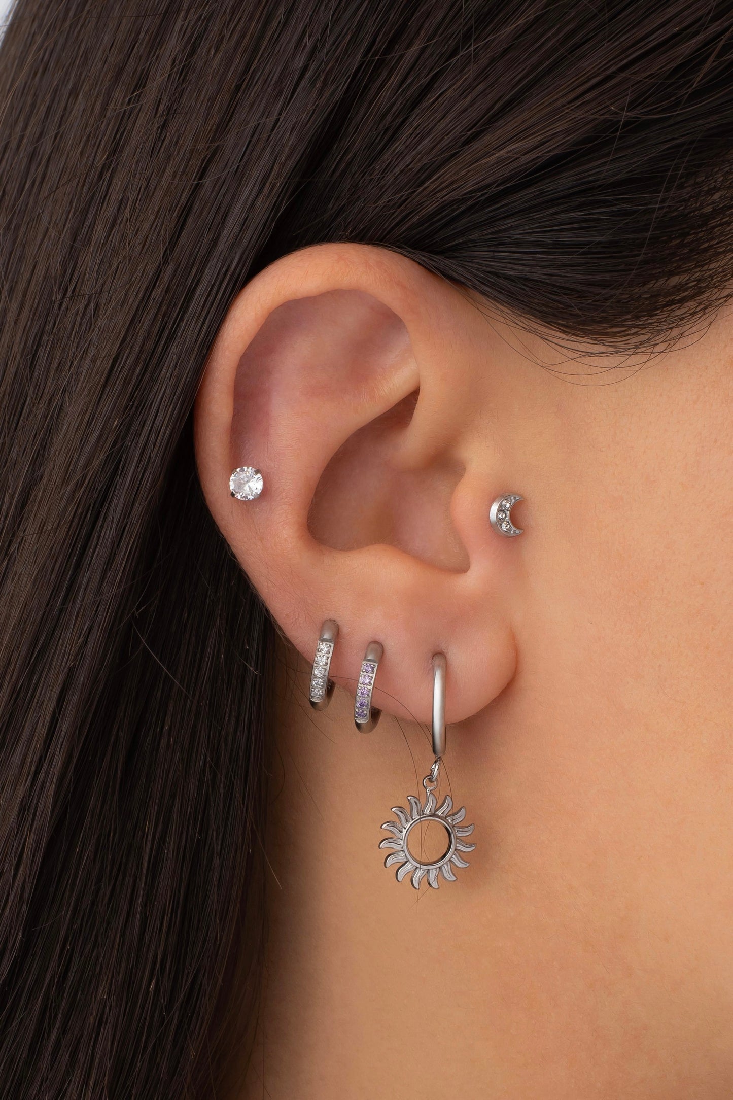 Silver earring piercing